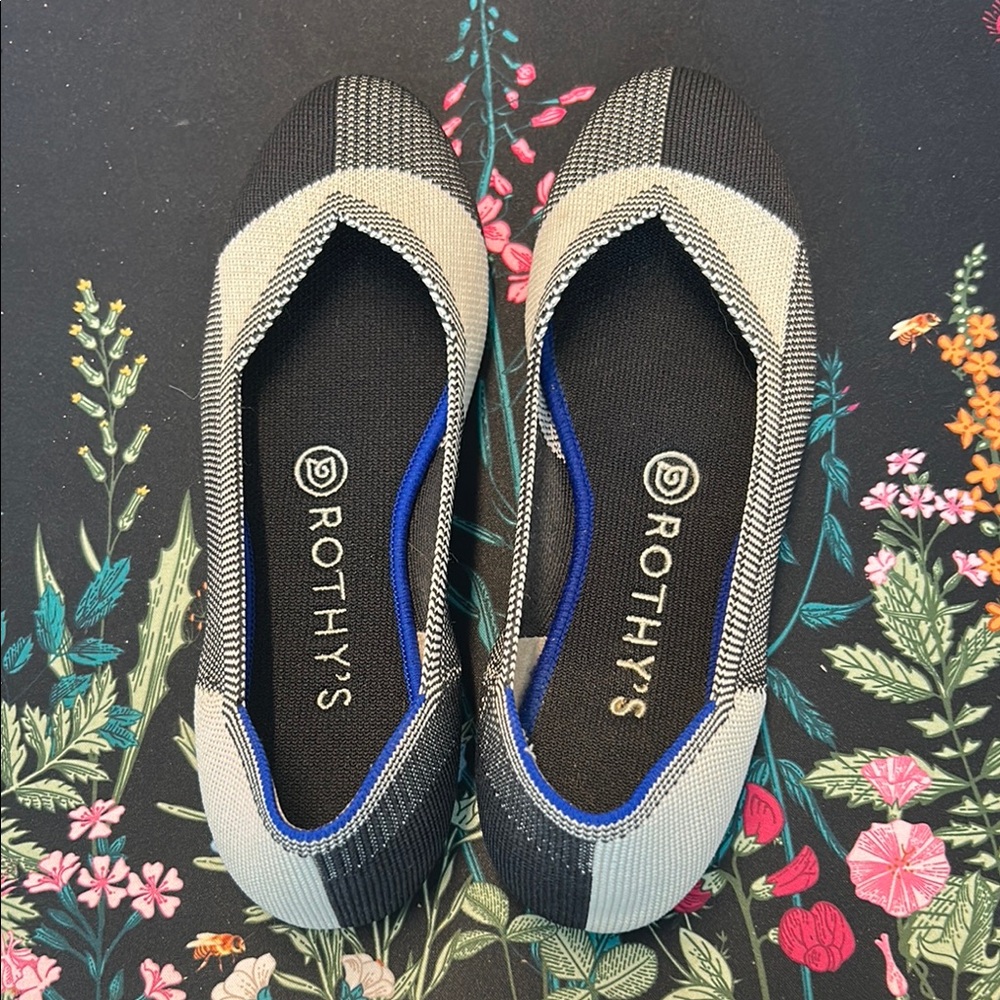 Rothy's Elegant Black and Cream Flats